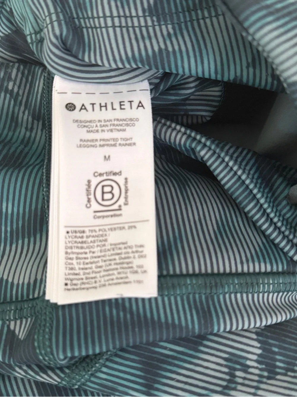 Athleta Rainier Printed Tight Leggings Medium Green Floral Zip Pockets